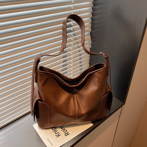 Vintage brown large capacity tote bag with side utility pockets for daily commute