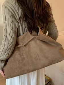 Minimalist large capacity brown suede tote bag for women shown with a model for winter style
