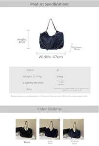 Detail showing the dimensions and blue denim texture of the oversized shoulder tote bag