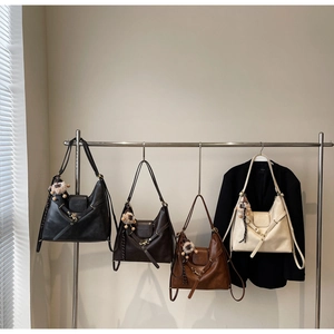 Collection of large faux leather tote bags in four colors with cute plush pendants