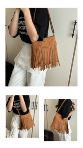 Close-up of caramel suede crossbody bag with long fringes and adjustable shoulder strap