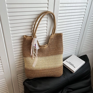 Bohemian woven straw tote bag with beaded lace charm and contrast stitching