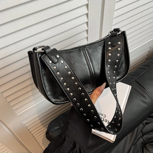 Modern black rivet shoulder bag with silver studs and metal ring strap for women