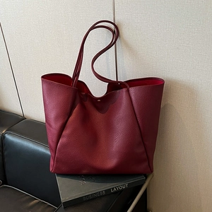 Large burgundy leather tote bag with lychee texture and magnetic gold buckle for women