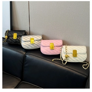 Detail showing four colors of quilted crossbody bags with gold chain and metal clasp