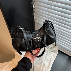 Vintage black crescent hobo bag with pleated texture and wide buckle detail