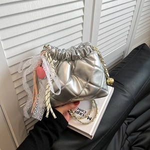 Silver quilted chain bucket bag with lace ribbon and heart charm for women