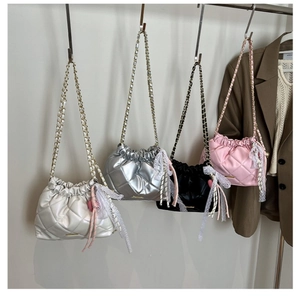 Quilted chain shoulder bags in four colors with drawstring closure and bow detail