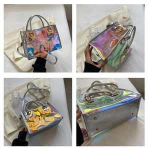 Detailed views of iridescent laser PVC small square bag with silver PU handles and gold lock