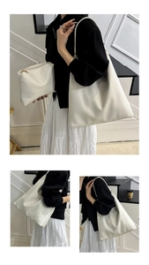 Detailed view of the off-white lychee texture leather tote bag set with matching pouch