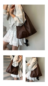 Detail view of large dark brown tote bag with thick lychee texture for daily commute