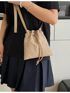 Khaki large capacity nylon drawstring shoulder bag for casual travel and outdoor use