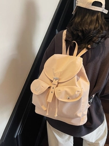 Fashionable light pink nylon backpack for women with flap cover and adjustable buckles