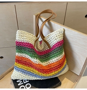 Detailed view of handmade colorful crochet texture on a large beach tote bag