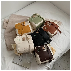 Collection of colorful contrast small square crossbody bags in various trendy colors