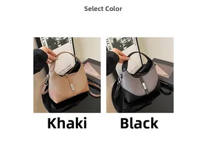 Detail view of khaki and black contrast patchwork handbags with premium textured fabric