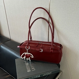 Elegant wine red glossy leather shoulder bag with pearl heart charm and silver buckle