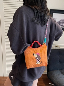 Bright orange dachshund embroidery nylon handbag with adjustable braided shoulder strap