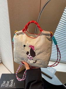 Off-white dachshund puppy embroidery canvas handbag with red woven rope handle and strap