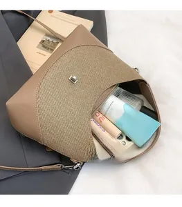 Detail view of contrast color handbag interior with spacious storage for essentials