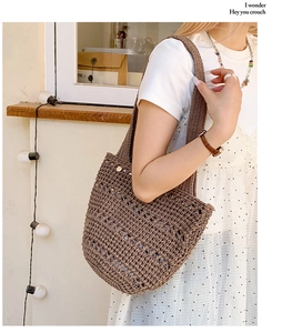 Close-up of brown crochet hollow woven tote bag texture with bohemian style