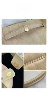Detail van beige krokodillenleer reliëf met verstevigde handvatten en metalen magneetsluiting