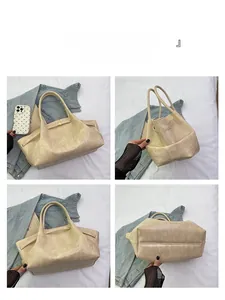 Detailweergave van beige retro tas met voor-, zij- en onderkant in kiezelleder