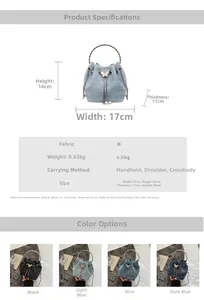 Detailed view of the woven denim bucket bag with pearl tassels and metal chain strap