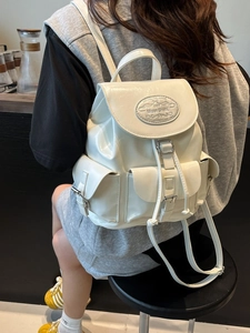 Stylish white large-capacity backpack with metallic buckle accents and multi-pocket design