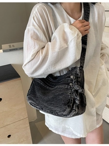 Retro washed denim crossbody bag for women with multiple zippers and tassels