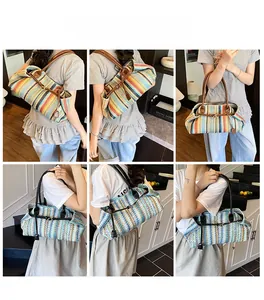 Detail of colorful woven shoulder bags with leather straps and bohemian striped patterns