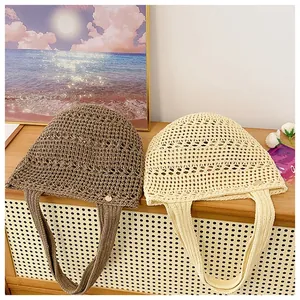 Detailed macro view of bohemian hollow crochet pattern and woven texture on a tote bag