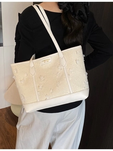 Large beige tweed tote bag with 3D floral petals and leather straps for summer style