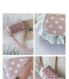 Close-up of pink polka dot crossbody bag featuring white lace trim and leather texture