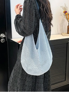 Handmade light blue crochet knit beach bag with black faux leather strap for women