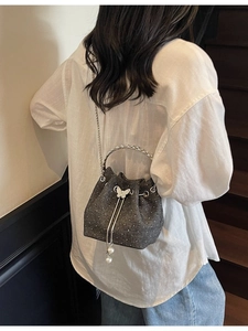 Fashionable dark grey drawstring bucket bag with sparkling crystals and pearl tassels