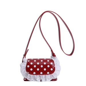 Red polka dot crossbody bag with white lace trim and slim leather strap for girls