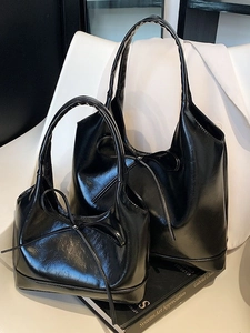 Minimalist black glossy PU leather tote set with ribbon accent for stylish commuting