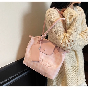Pink checkered tote bag with cartoon embossing and matching mini pouch for women