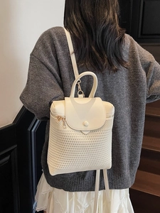 Chic cream straw woven backpack for women with leather lid and adjustable straps