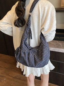 Blue and white checkered canvas hobo bag with large capacity and adjustable strap