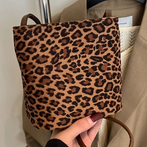 Fashionable leopard print suede bucket bag with brown leather strap for women