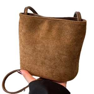 Vintage brown frosted suede bucket bag with adjustable shoulder strap for women