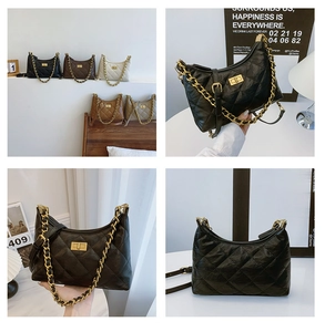Detailed view of the quilted leather dumpling bag showing five colors and chain strap