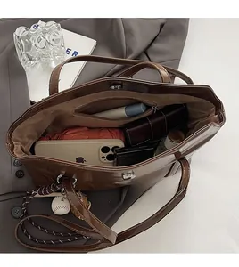 Macro view of spacious interior storage with side pocket for various daily essentials