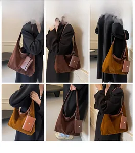 Detail view of vintage faux suede tote bag with matching mini pouch in caramel brown