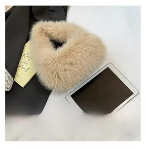 Macro shot of fluffy light beige faux fur texture on a stylish winter accessory