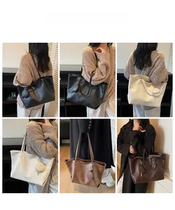Detailed view of large tote bag with round coin purse accessory in multiple colors