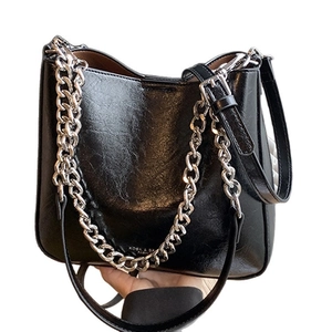 Retro black glossy underarm tote bag with silver chain and adjustable shoulder strap