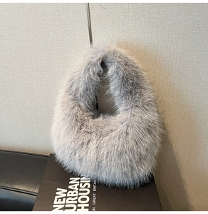Detail of the soft faux fur texture on this stylish grey plush handbag for autumn